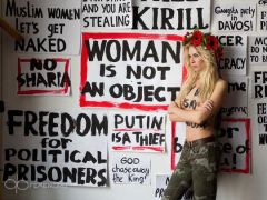 Femen Protest As Berlusconi Casts Ballot