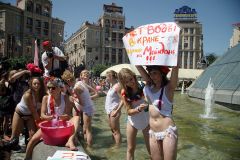 FEMEN Annual protest against regular summer Hot water switch Off