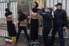 Woman's rights organization FEMEN protest against The execution Of A woman In Iran In front Of The Iranian embassy In Berlin