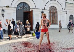 In Kiev, A Femen activist protests against The Russian involvement In Ukraine