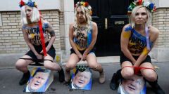 Paris based Ukrainian feminist protest group Femen turned Up outside The Ukranian embassy In The French capital On Sunday To give their Own special message