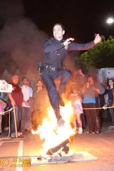 Nowruz, Iranian New Year, Persian New Year - cop jumping over a fire 2016.jpg