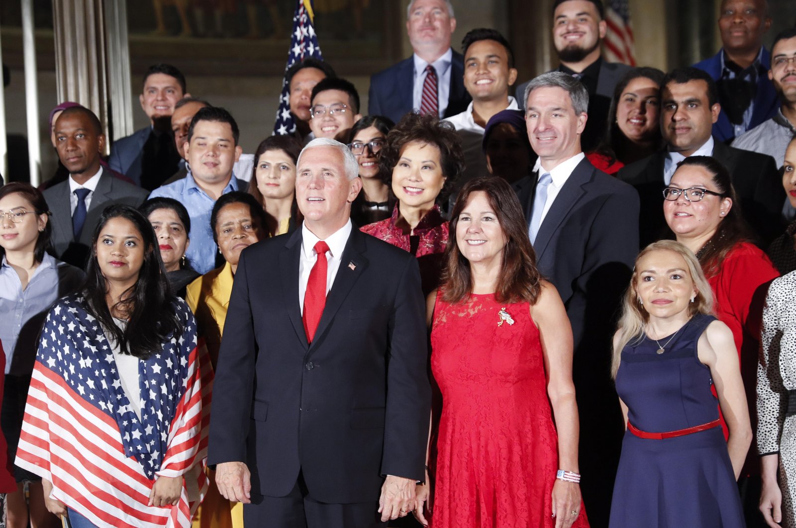 Vice President Mike Pence, center, his wife Karen Pence, to his right.jpg