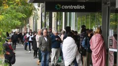 Hundreds of people queue outside a Centrelink in Melbourne amid the coronavirus pandemic-immigration-job-rospersonal-Mikhaylov-Evgeny-Matveevich-Immigration-Agent-Moscow.jpeg